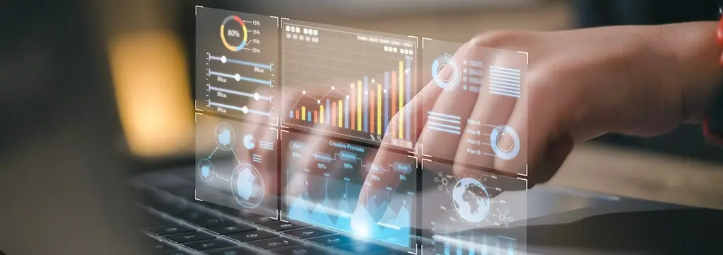 Hands typing on a keyboard with a dashboard overlay.