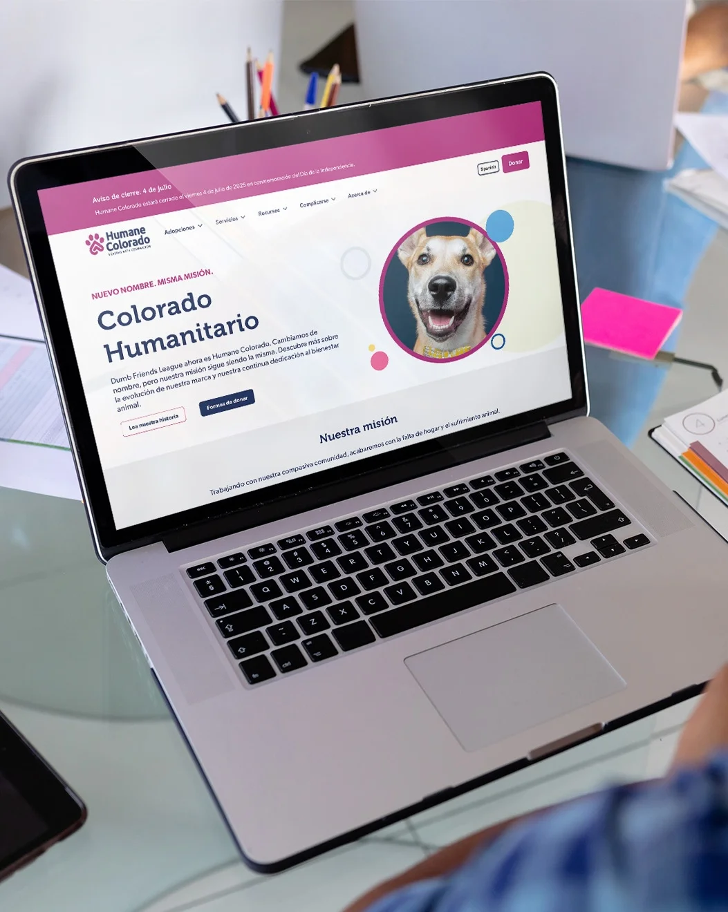 Custom WordPress multilingual (Spanish) website developed in Denver for Humane Colorado displayed on laptop.